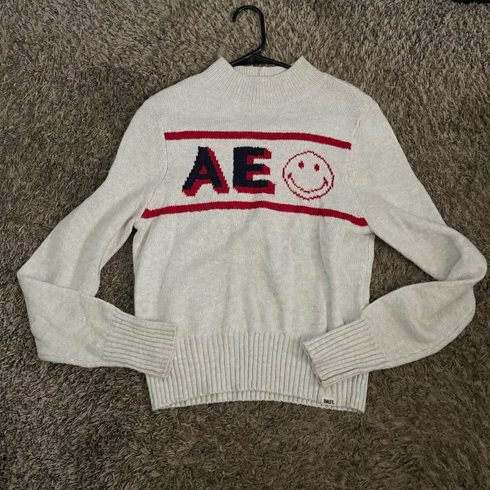 American Eagle Outfitters Cream Sweater with Red and Black Design